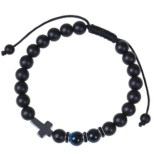Close-up of 8mm black matte stone beaded bracelet with cross charm and adjustable cord