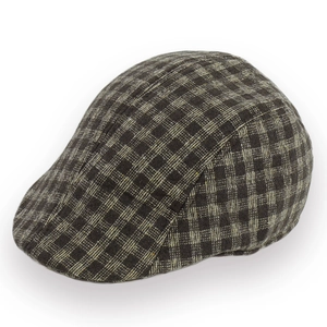Nahaufnahme der retro karierten Schiebermütze in braunem und beige Hahnentritt-Muster