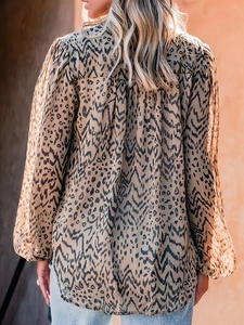 Women's casual leopard print long sleeve shirt with a loose fit and lantern sleeves back view