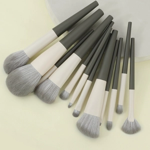 11-piece minimalist travel makeup brush set with gray bristles and olive green handles