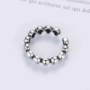 Vintage punk silver adjustable open ring featuring multiple skull head designs