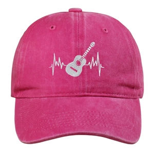 Detailed white embroidery of guitar and heartbeat pulse on washed cotton baseball cap
