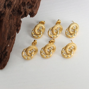 Exaggerated golden double-loop zircon earrings with vintage twisted rope texture for women