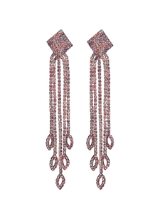 Detailed macro view of long rose pink rhinestone tassel earrings with leaf-shaped charms