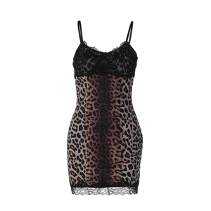 Detail of leopard print mini dress featuring black lace trim and slim spaghetti straps