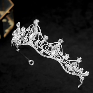 Detailed view of bridal crown with silver alloy openwork and clear marquise crystals