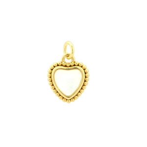 Macro shot of 18K gold plated heart pendant with white crystal and vintage beaded edge