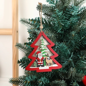 Red and green wooden Christmas tree hanging sign with hand-painted Santa and reindeer motifs