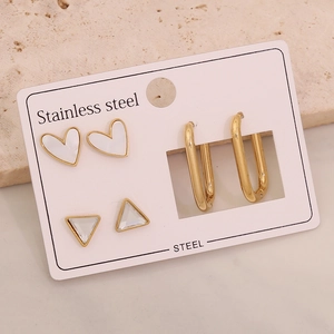 Detail of 3-pair stainless steel earring set featuring heart, triangle and oval hoop designs