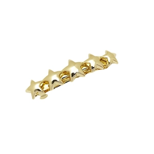 Minimalist golden metal star hair clip with five interconnected 3D stars on white background