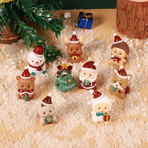 Miniature Christmas resin figurines set featuring Santa, reindeer and tree in snow