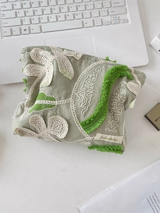 Floral embroidered cotton linen makeup bag with 3D tufted flowers and zipper closure