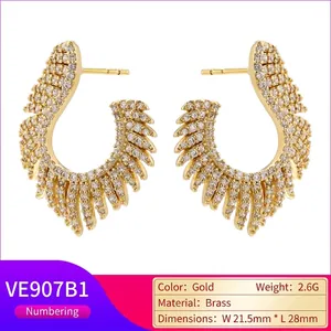 Luxurious gold feather wing earrings with micro-paved cubic zirconia stones