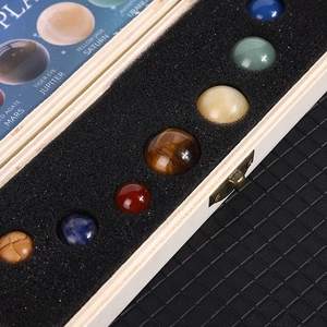 Solar system crystal stones gift set with nine planetary gemstones in a wooden display box
