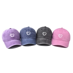 Distressed washed cotton baseball caps with embroidered hearts in four assorted colors