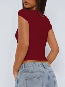 Detail of deep red slim fit V-neck knit T-shirt showing back view and textured fabric