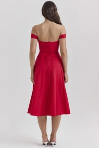 Detail view of the elegant open back design and slim waistline of this red floral maxi dress