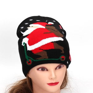 Black knit Christmas beanie featuring a festive Santa Claus skating pattern for winter warmth