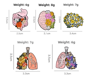 Detailed dimensions of five anatomical organ pins featuring floral and butterfly motifs