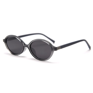 Retro oval polarized sunglasses with dark grey transparent frames at a 45-degree angle