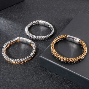 Detail of men's stainless steel double chain bracelets with magnetic clasp in three finishes
