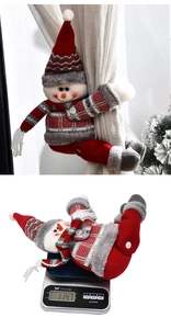Détail de l'attache-rideau bonhomme de neige de Noël avec poids de 114,7g affiché