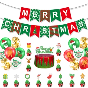 Flat lay of Merry Christmas party set with banners, cake toppers and latex balloons