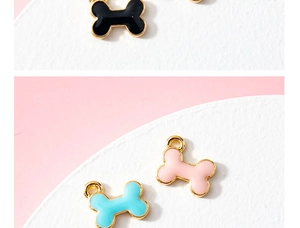 Detailed macro view of colorful enamel dog bone alloy pendants for DIY jewelry making