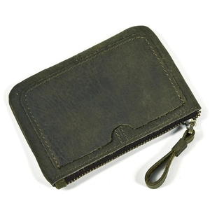 Detail of dark green crazy horse leather wallet showing stitching and metal zipper