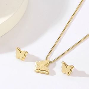 Golden titanium steel butterfly jewelry set with frosted texture and square zircon