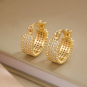 Elegant gold-plated hoop earrings with pavé cubic zirconia and beaded edge texture