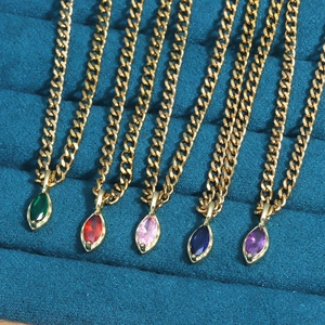 Marquise cut zircon necklace set with five colors on golden Cuban chain in a blue velvet tray