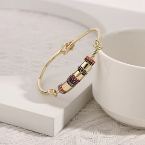 18K gold plated copper cuff bracelet with five colorful zircon inlaid geometric sliders
