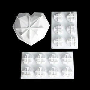 Detailed macro of white silicone ice cream molds with geometric 3D heart shapes