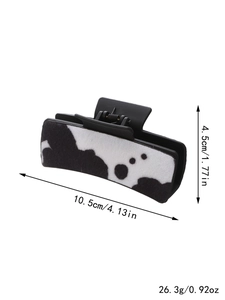 Cow print hair claw clip dimensions showing 10.5cm length and 4.5cm height measurements