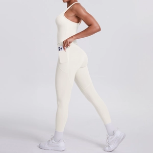 Detail showing high-waisted yoga onesie with functional side pocket for mobile phone