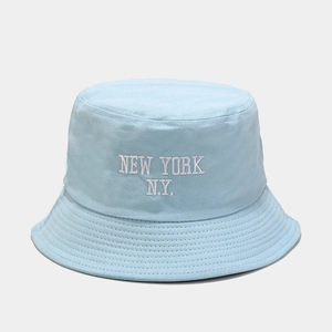 Detail of light blue cotton bucket hat featuring white New York N.Y. embroidery