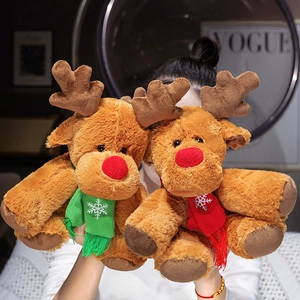 Plush Christmas reindeer toys with snowflake scarves and red pom-pom noses