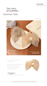 Close-up of champagne mesh scrunchie with rhinestones and large decorative bow