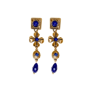 Vintage floral tassel earrings in gold finish with blue gemstones on white background