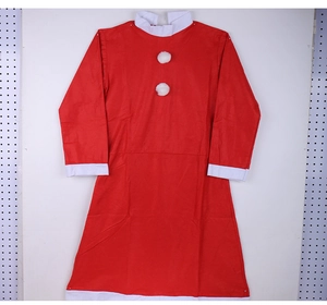 Detail of red Christmas long-sleeve dress featuring white fur collar and decorative pom-poms