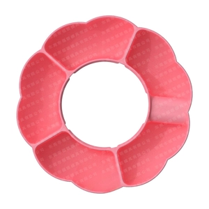 Detailed top view of a pink petal-shaped 7-compartment silicone snack tray for cups