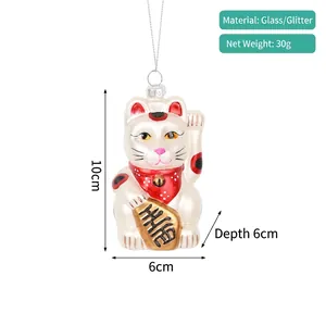 Detailed view of hand-painted glass lucky cat Christmas ornament with glitter accents