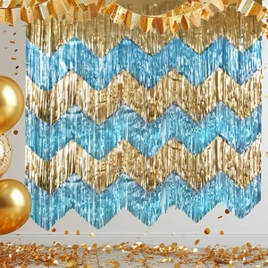 Festive gold and light blue wavy foil fringe curtain backdrop for birthday party decorations