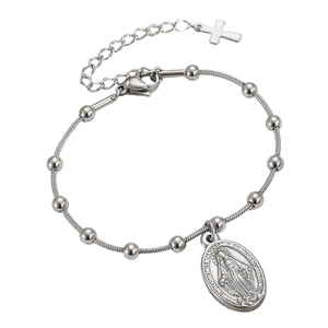 Detailed view of silver stainless steel miracle medal and cross charm on bead chain bracelet
