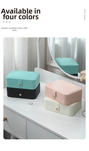 Close-up of portable jewelry boxes in four colors with PU leather and metal snap button