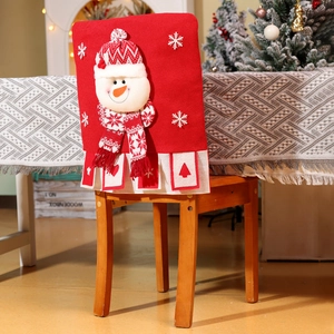 Close-up of knitted Christmas chair cover featuring a 3D snowman with plaid hat and scarf