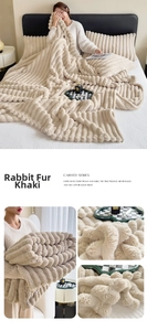 Detail of khaki carved rabbit faux fur blanket showing plush flannel texture and stripes