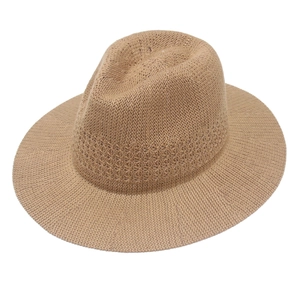 Classic khaki hand-woven Panama hat with decorative openwork band for beach sun protection