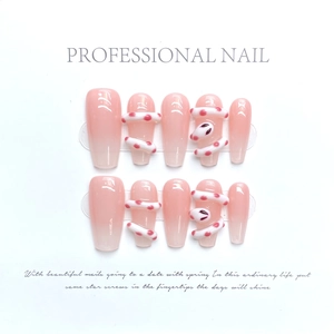 Pink gradient press-on nails set with 3D white snake design and glossy finish